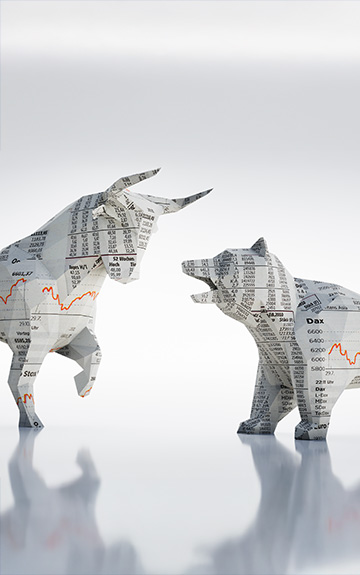 Bulle und Baer bestehend aus Aktienkursen stehen sich gegenüber